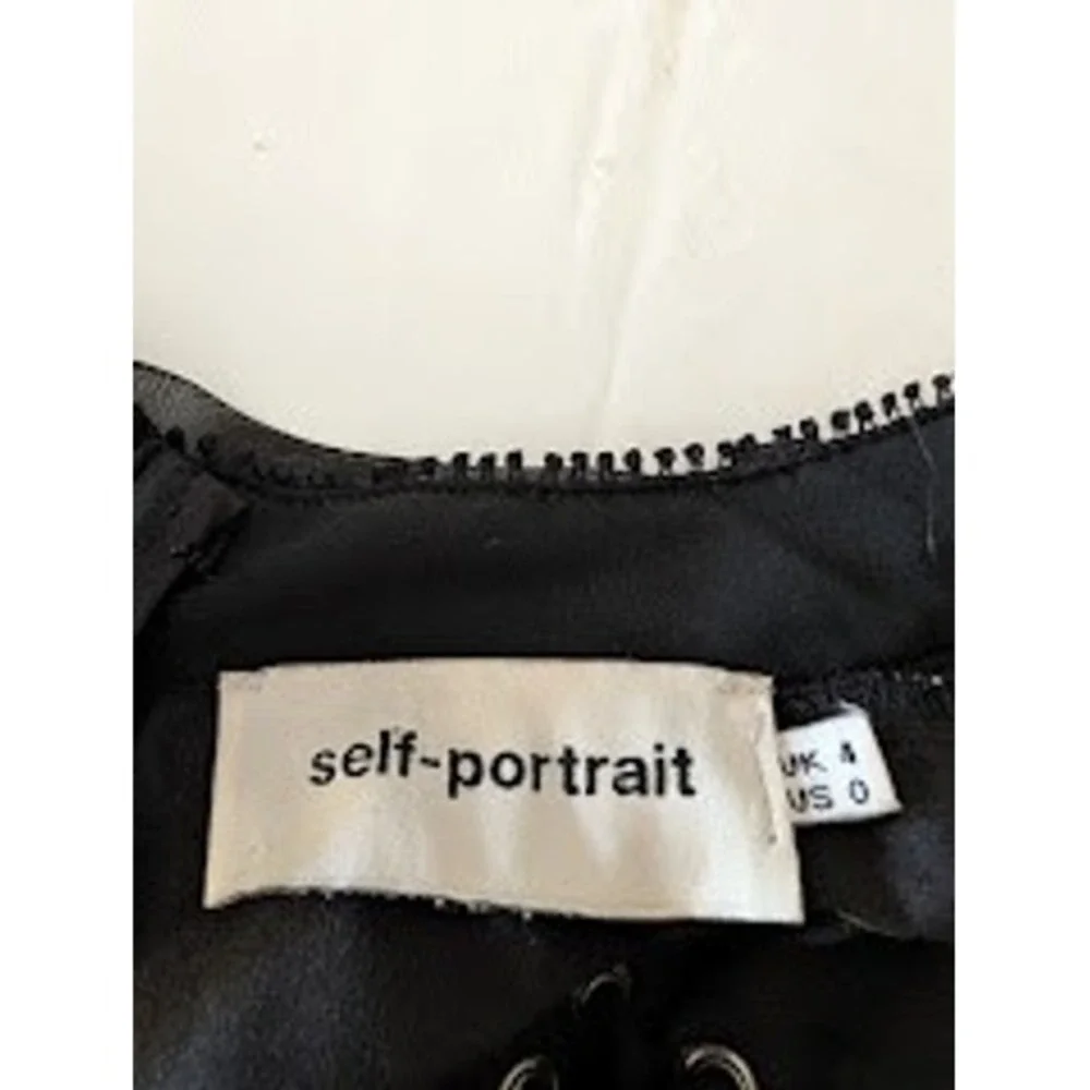 Self-Portrait command attention